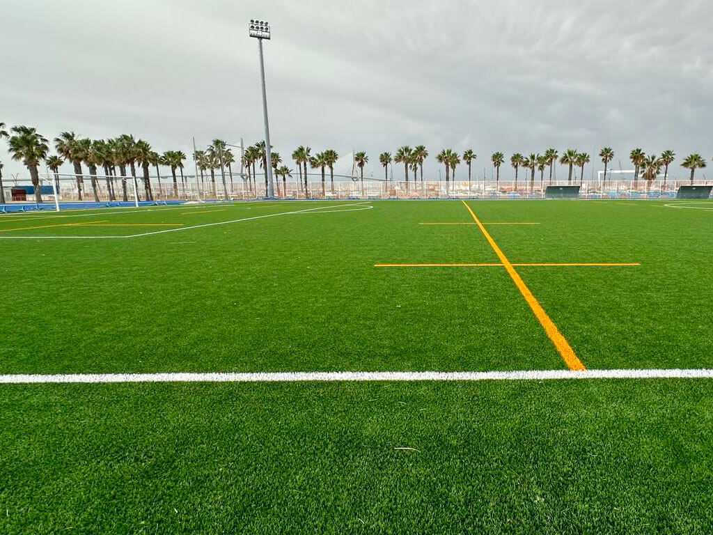 Obras de sustitución de césped en campo de fútbol Manuel Irigoyen, situado en el CD Puntales, Cádiz. Image
